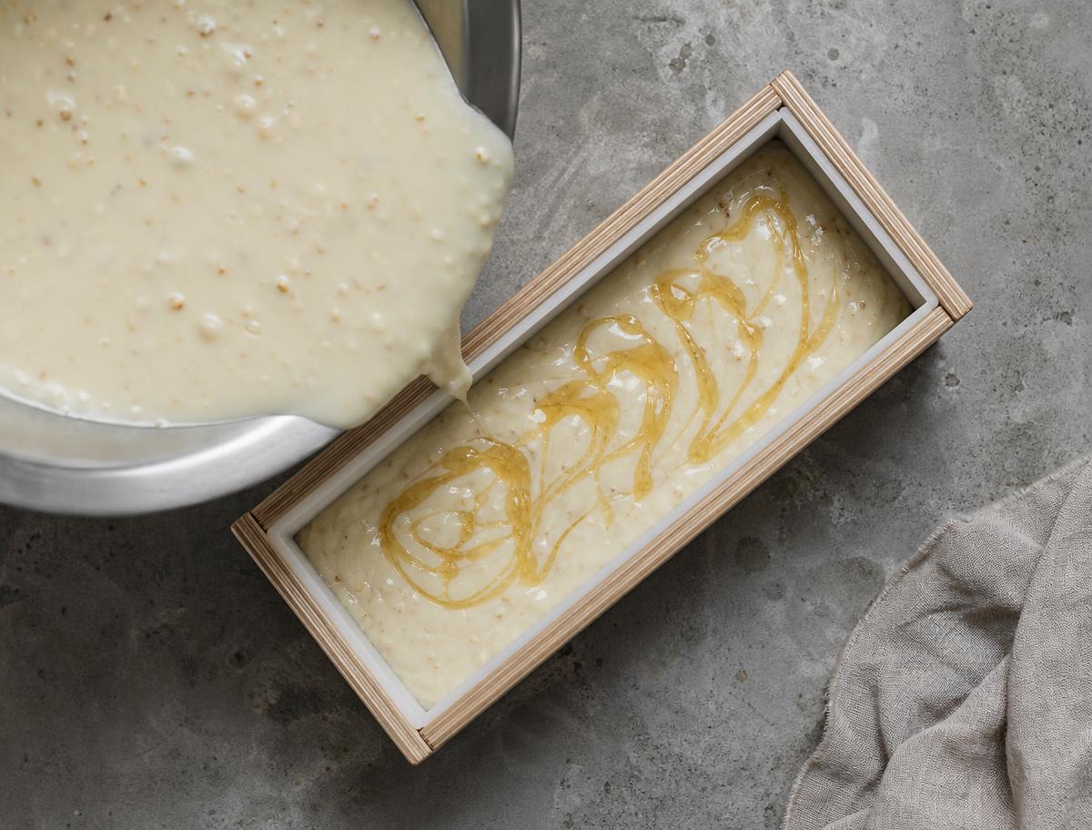 Oatmeal and honey soap batter poured into a wooden mould